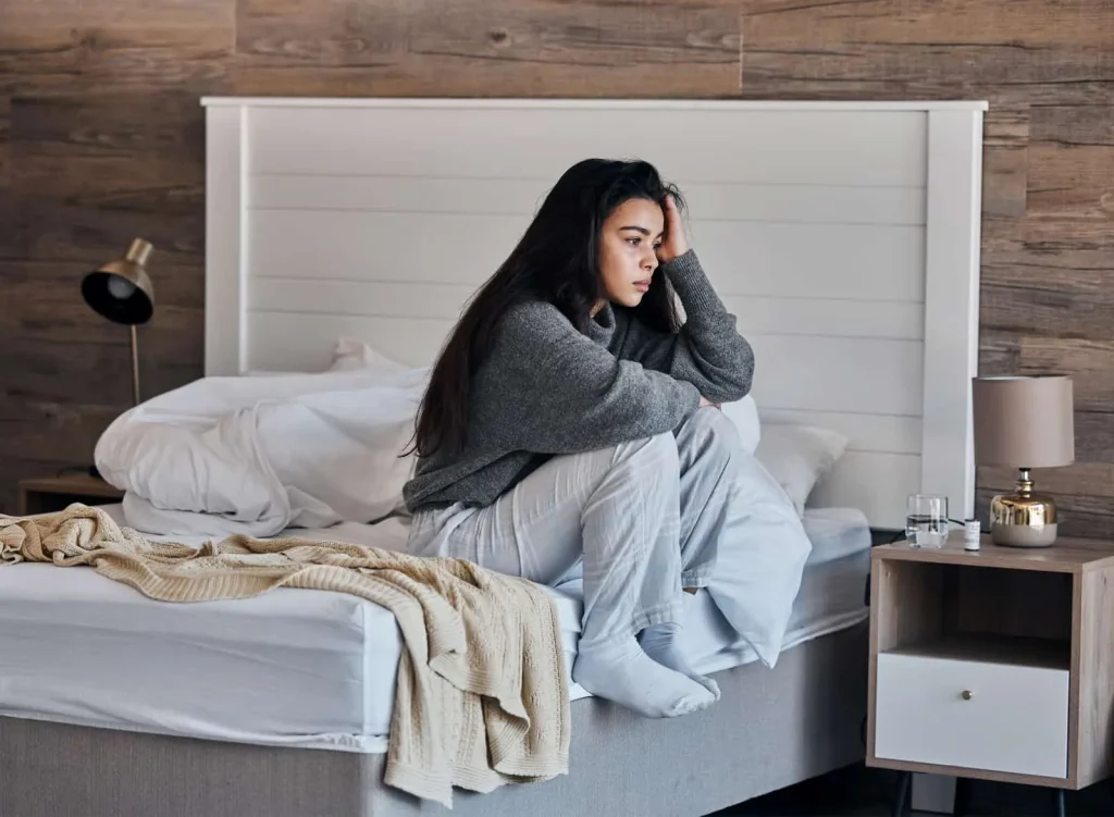 morning-anxiety-woman-sitting-on-bed